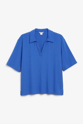 Kurzärmeliges Oversized-Poloshirt - Monki - Modalova