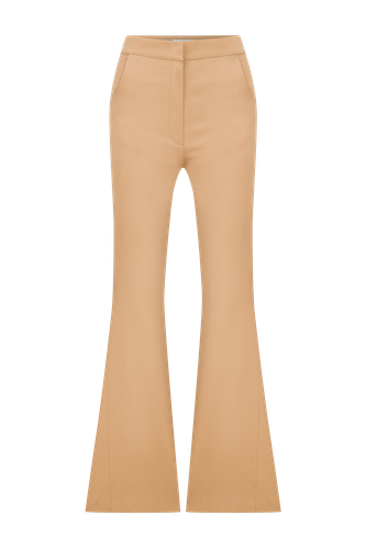 Avrell Cotton Flared Trousers in Golden Straw - Nazli Ceren - Modalova