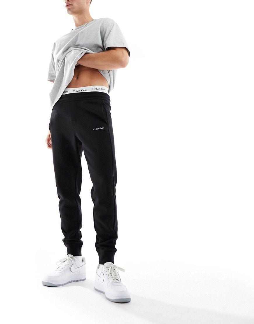 Repreve - Joggers neri con logo micro - Calvin Klein - Modalova