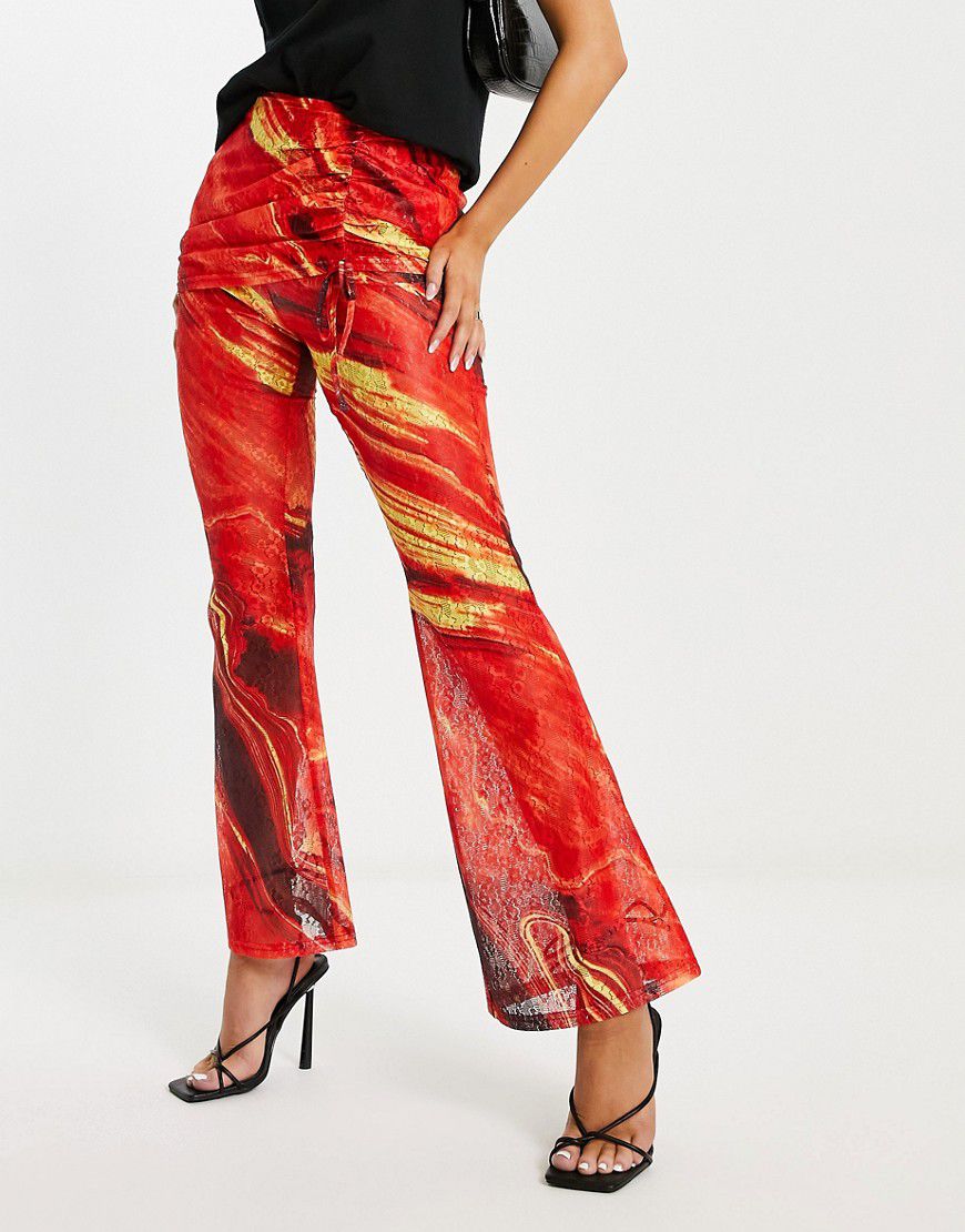 Pantaloni con stampa effetto lava multicolore con gonna sovrapposta con laccio - Annorlunda - Modalova