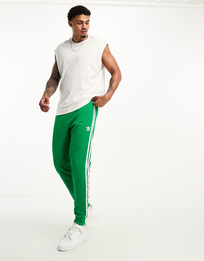 Joggers verdi e argento - adidas Originals - Modalova