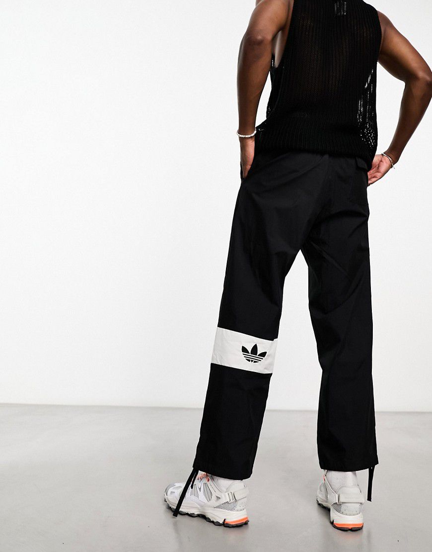 Rifta - Pantaloni cargo colorblock neri con logo - adidas Originals - Modalova