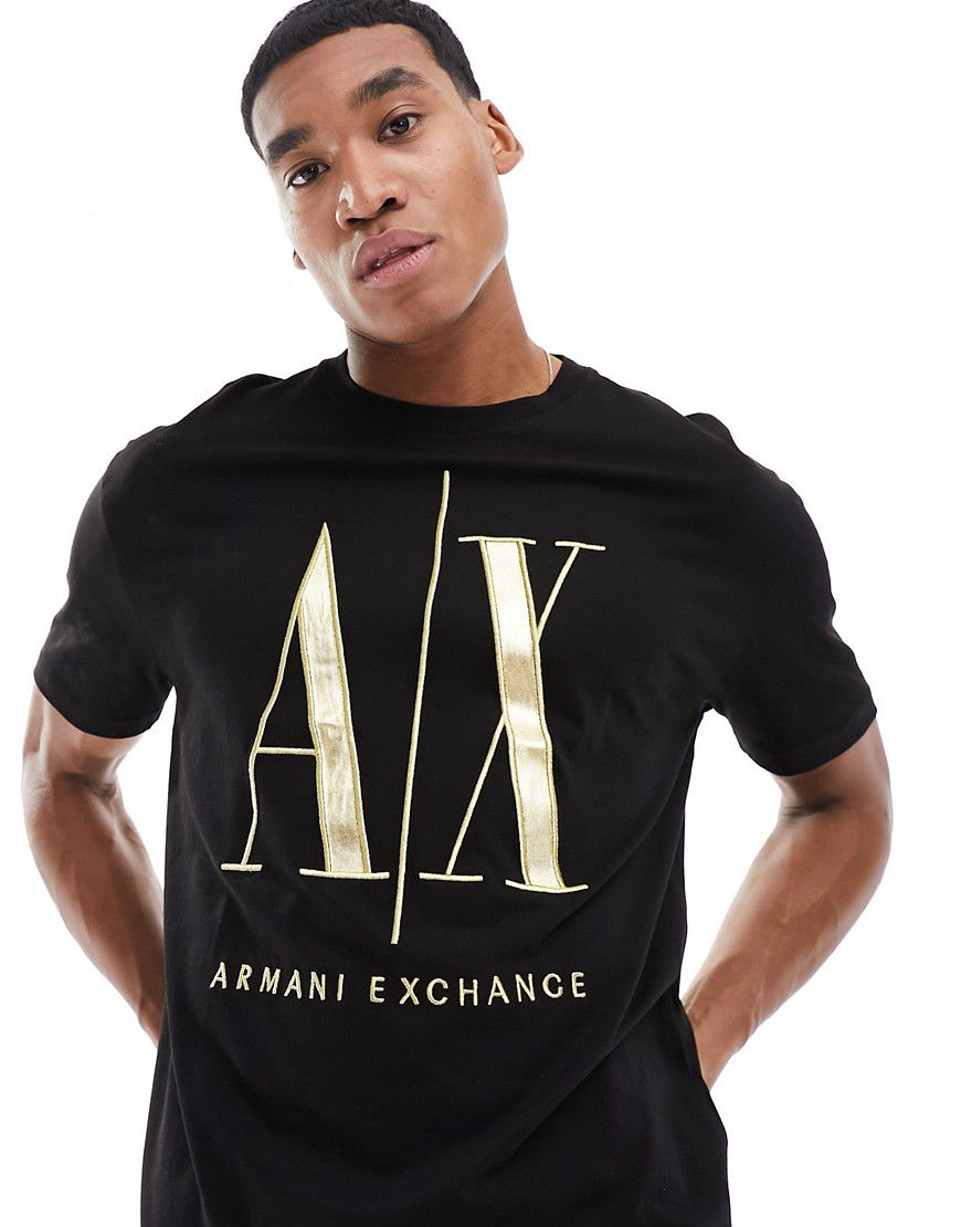 T-shirt nera con logo grande oro - Armani Exchange - Modalova
