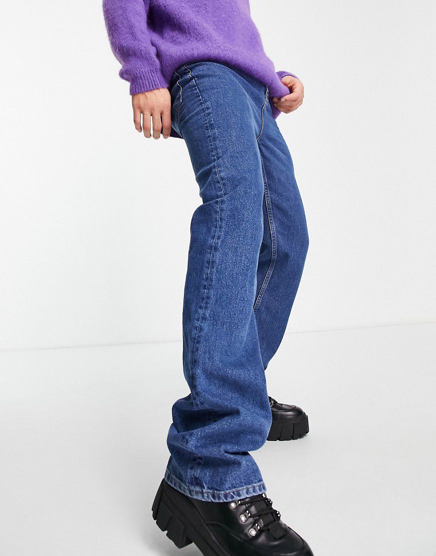 Jeans a zampa elasticizzato lavaggio pietra scuro - ASOS DESIGN - Modalova