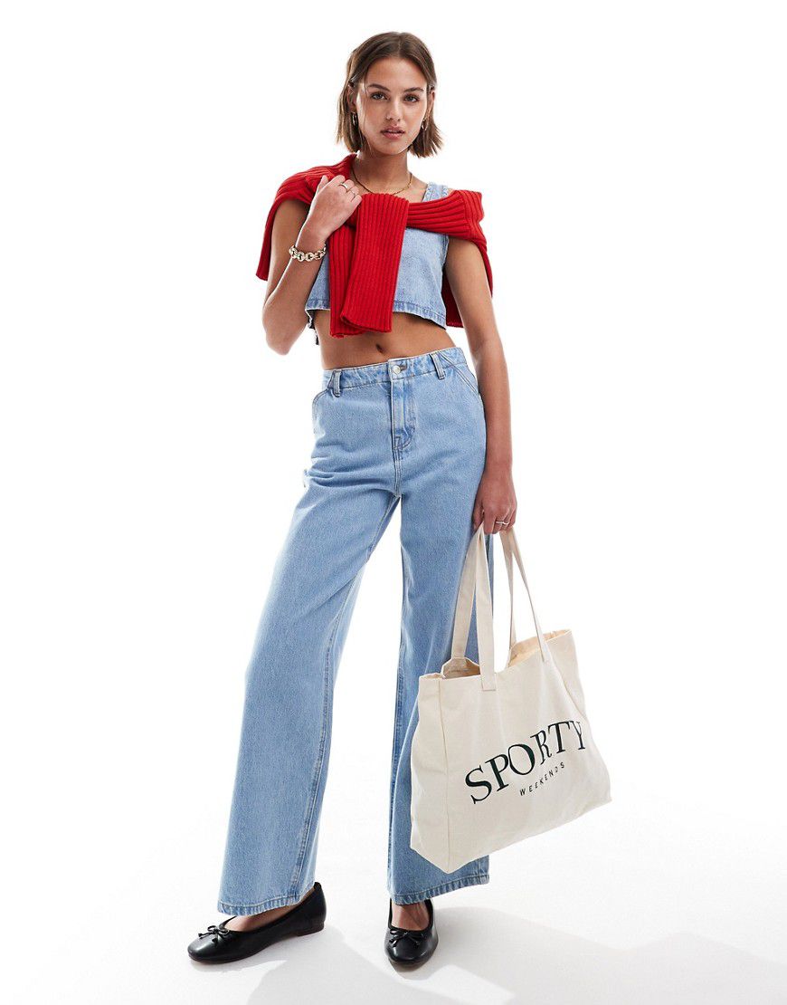 Jeans a fondo ampio lavaggio medio con fascia in vita minimal in coordinato - ASOS DESIGN - Modalova