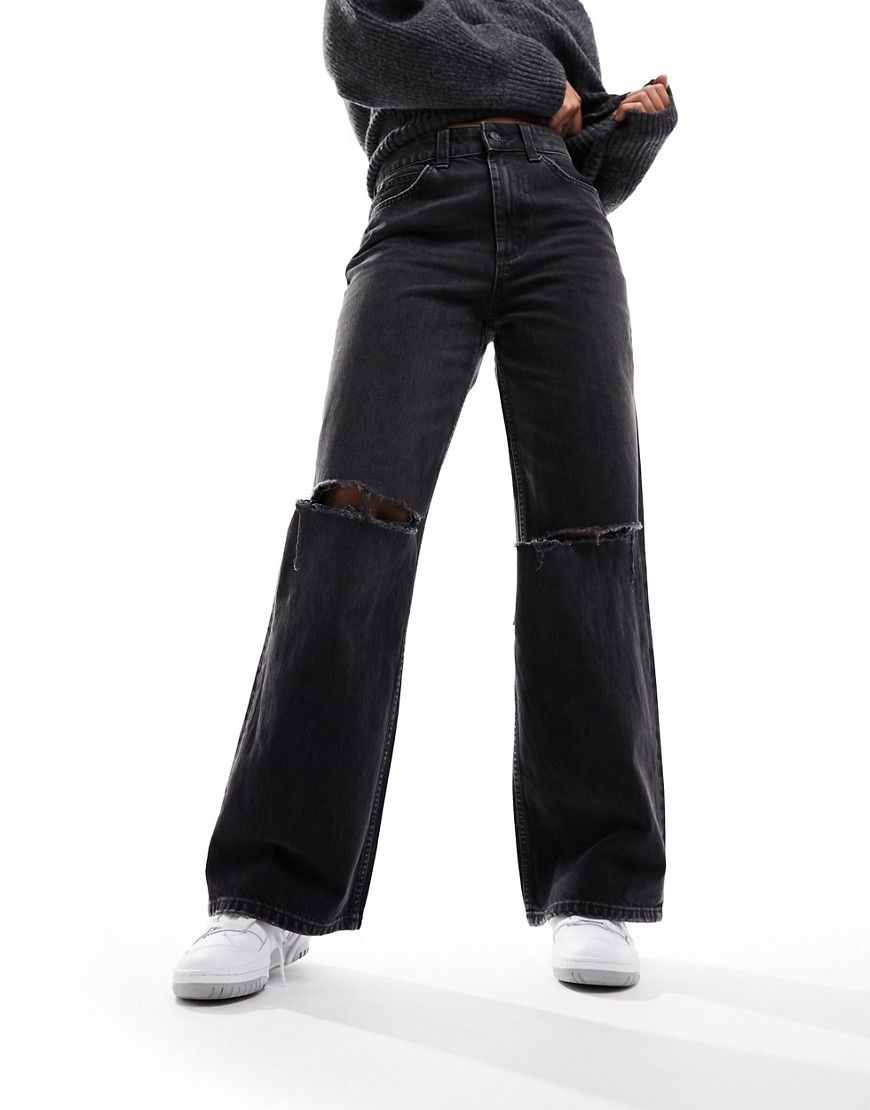 Jeans dad neri con strappi - ASOS DESIGN - Modalova