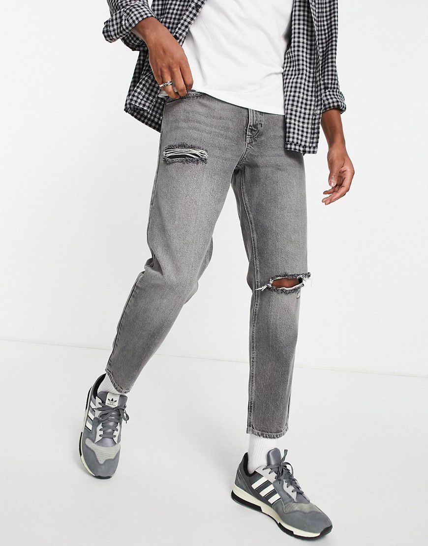 Jeans rigidi classici slavato con strappi alle ginocchia - ASOS DESIGN - Modalova