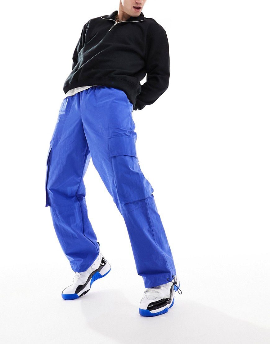 Pantaloni cargo a fondo ampio in nylon acceso con vita elasticizzata - ASOS DESIGN - Modalova
