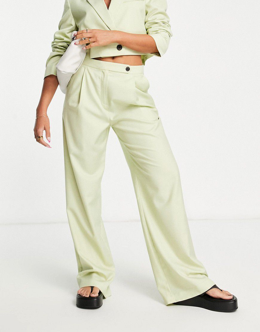 Pantaloni da abito extra larghi con fondo ampio color lime slavato - ASOS DESIGN - Modalova