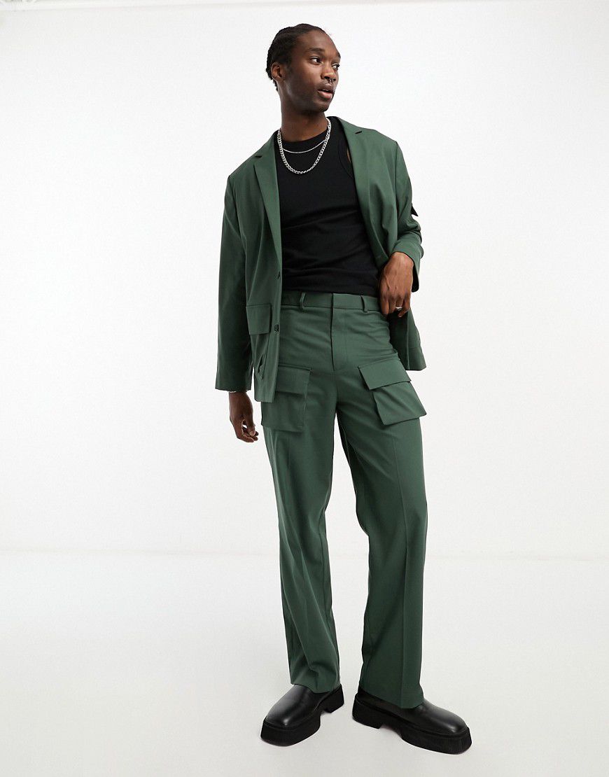 Pantaloni da abito verdi ampi con tasche cargo - ASOS DESIGN - Modalova