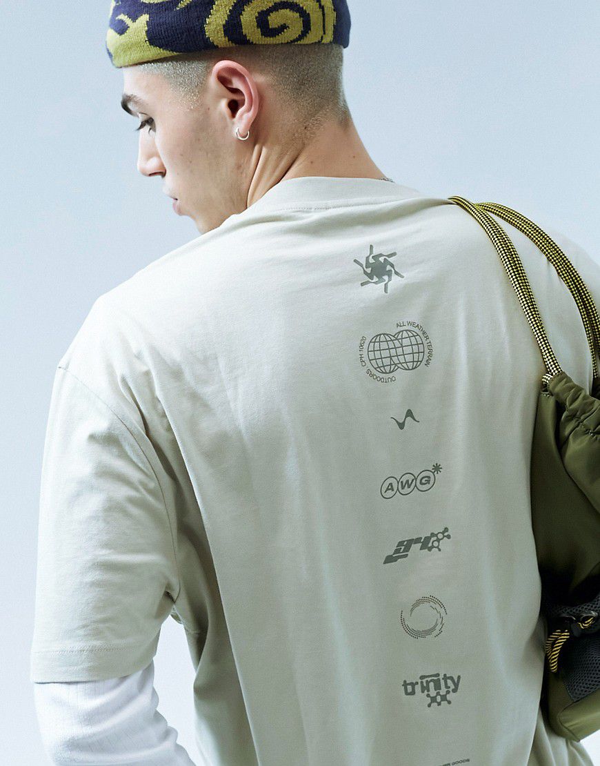 T-shirt oversize beige con stampa in verticale sul retro - ASOS DESIGN - Modalova
