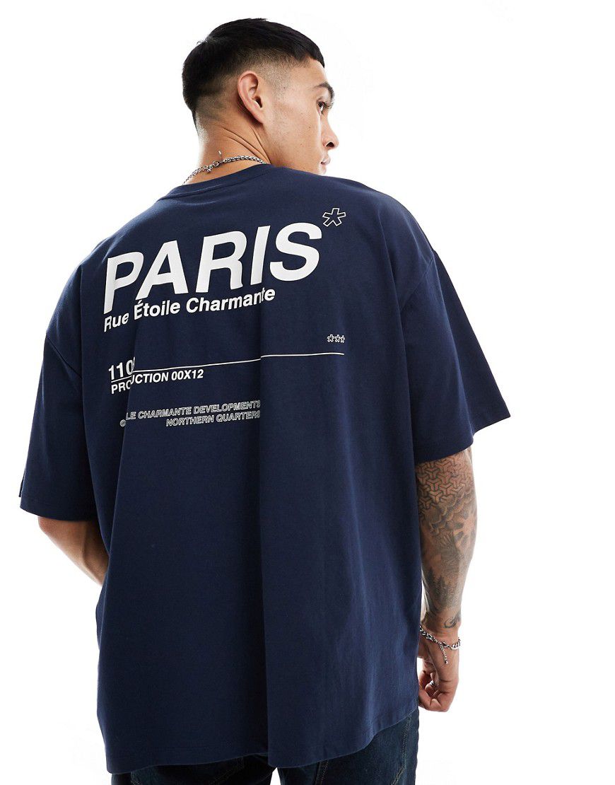 T-shirt oversize con scritta "Paris" stampata sul retro - ASOS DESIGN - Modalova