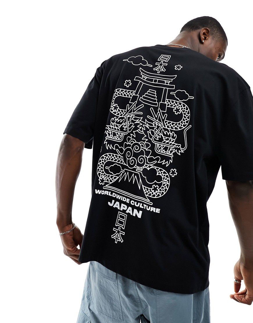 T-shirt oversize nera con stampa "Souvenir" sul retro - ASOS DESIGN - Modalova