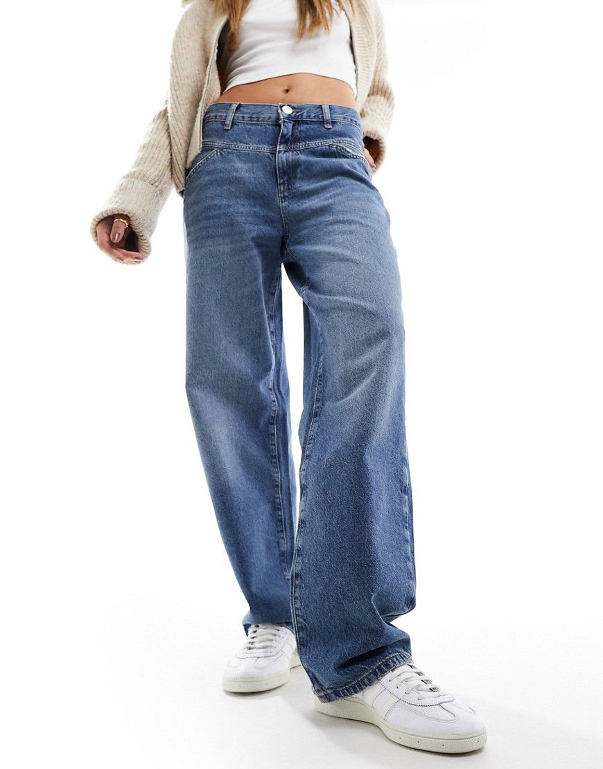 Jeans ampi a vita medio alta medio con strappi - Mango - Modalova