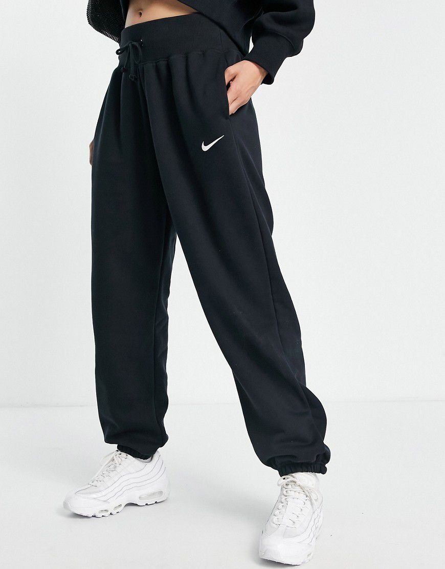 Joggers a vita alta oversize e color vela con logo piccolo - Nike - Modalova