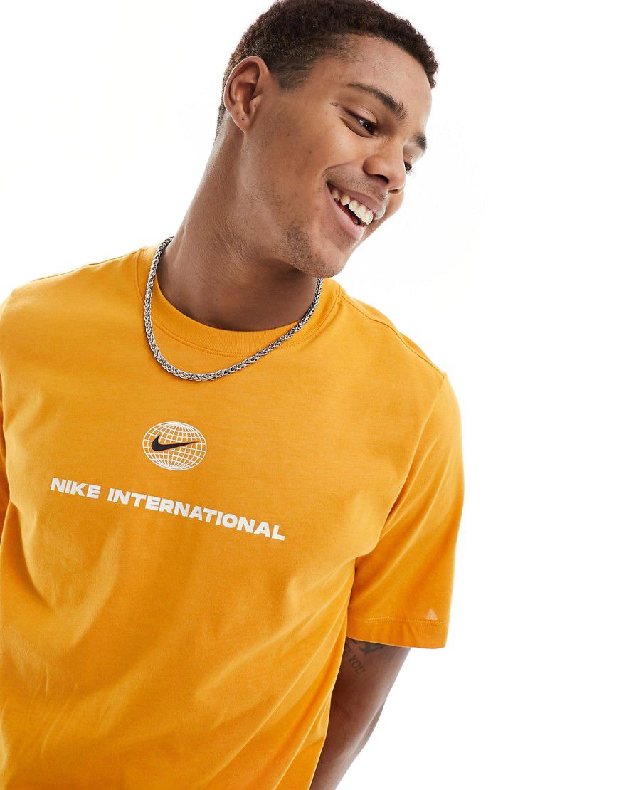 Heritage Dri-FIT - T-shirt arancione - Nike Running - Modalova
