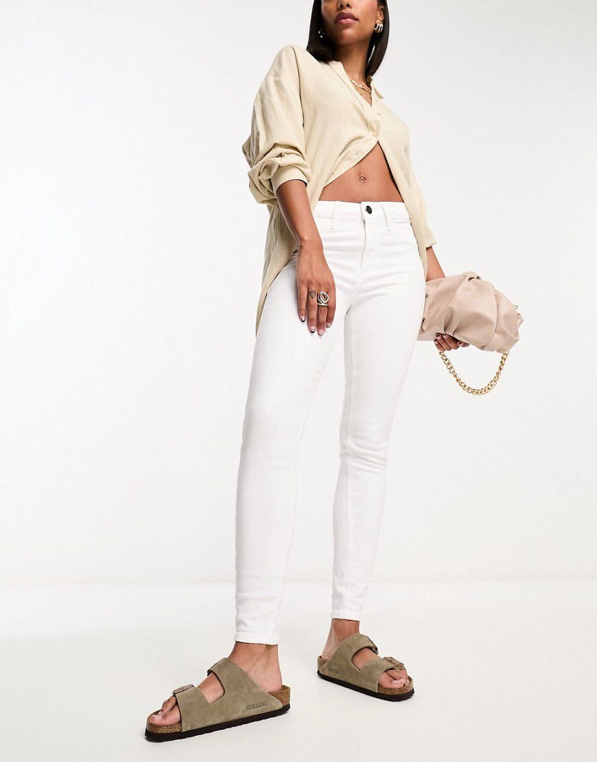 Molly - Jeans skinny bianchi a vita medio alta modellanti - River Island - Modalova
